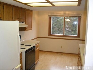 Cozy and sunny kitchen eating area.