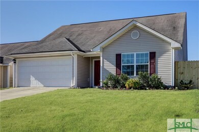 Great curb appeal with winter grass, flowers, and 