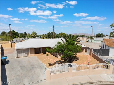 View of front of house featuring a gate, a fenced