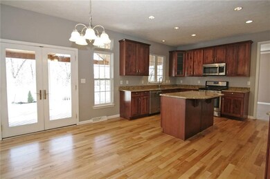 The spacious kitchen has plenty of room for the co