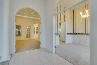 Foyer into dining and family room