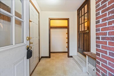 Mudroom with closet.