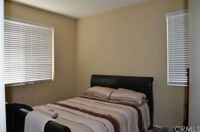 One of the secondary bedrooms.