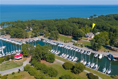 Bird's eye view of a nearby body of water and a marina