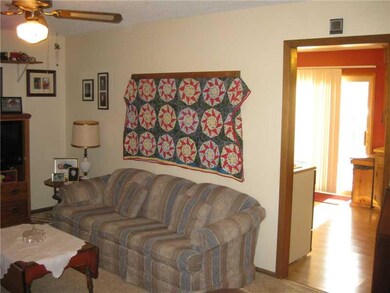 Living Room. View from the living room into the kitchen/dining area