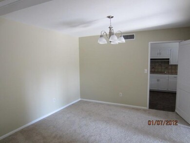Formal dining with views to kitchen