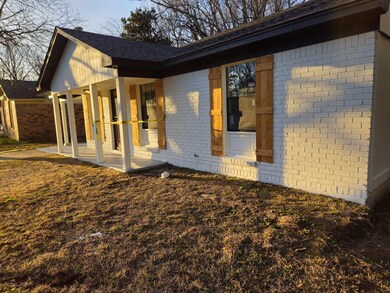 View of property exterior featuring a patio area