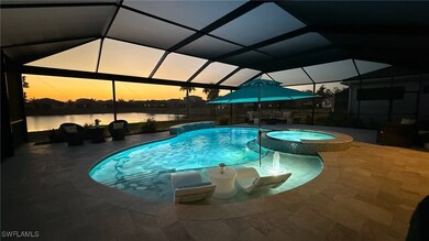 View of pool featuring a lanai, a patio, a water v
