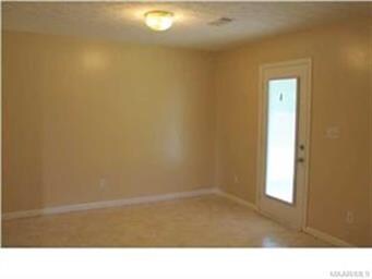 Dining area opens to covered back patio