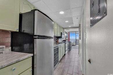 Kitchen with stainless steel appliances, beverage 