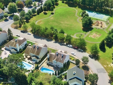 Across the street from a town park