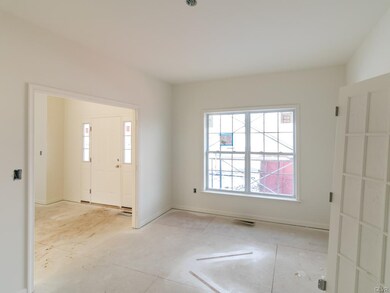Large Living Room or Study with french doors