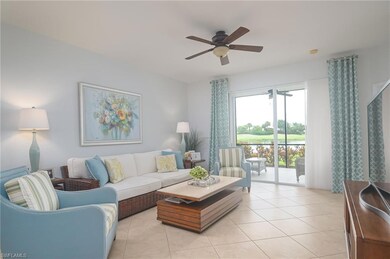 Living room featuring light tile flooring and ceil