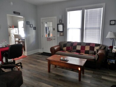 Main floor LR with plank vinyl flooring