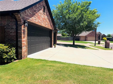 View of property exterior with brick siding, roof with shingles, and an attached garage
