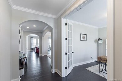 Foyer with curved entrance & mouldings