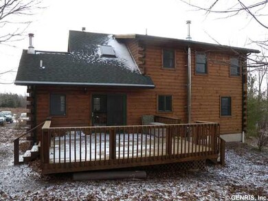 Deck. You access this 16  x 18  rear deck through 