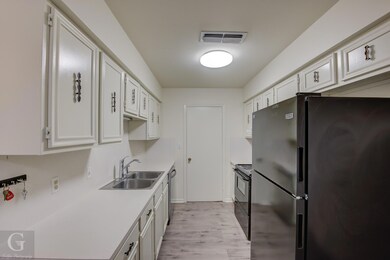 Kitchen with new floors, electric range oven and n