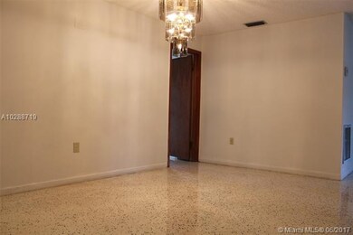 Formal dining room just off the kitchen.