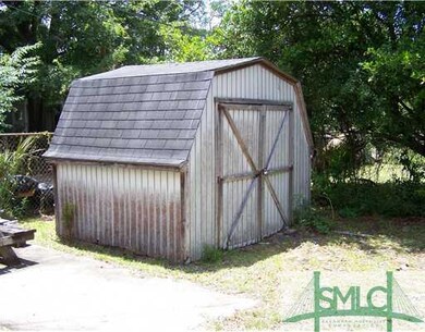 Other. Storage building behind house.