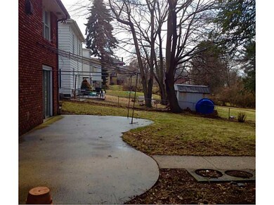 Patio/Deck. Concrete patio accents the back yard.