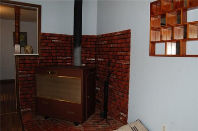 Ashley wood burning furnace in the living room - s