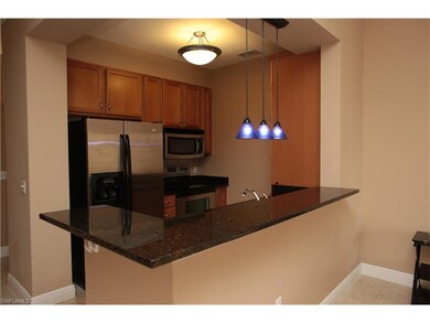 Stainless Steel and Granite Galley Kitchen