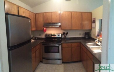 The Kitchen is well appointed with ceramic tile fl