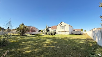 View of fenced backyard