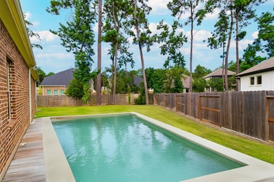 VIRTUALLY CREATED PHOTO! WELCOME TO YOUR STAYCATION OASIS IN THE WOODLANDS HILLS! Best One-Story Home in the Neighborhood! HUGE Back Yard! Plenty of room for a refreshing Pool! Let your imagination create your Back Yard Oasis!