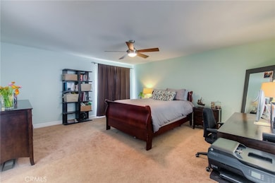 Large master suite with walk-in closet and balcony