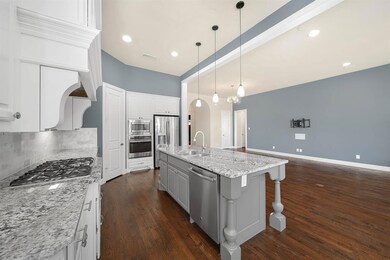 Open to Dining, Living, and Breakfast Nook.