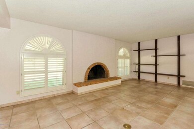 Great room to the back + fireplace