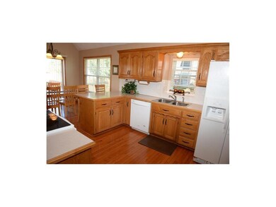 Kitchen with hardwood floors and plenty of sunligh