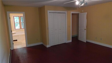 Roomy master with deep closets and...