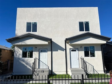 411 E 99th St, Los Angeles, CA 90003 - photo 2