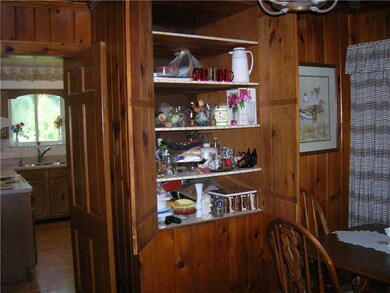 Dining Room. Large built in cupboard in dining roo