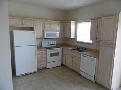 Nice kitchen with beautiful cabinets.