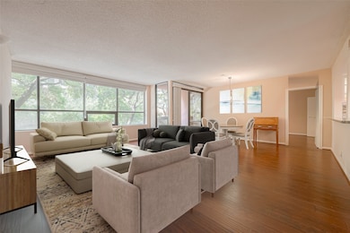 The living room is seamlessly connected to the bre