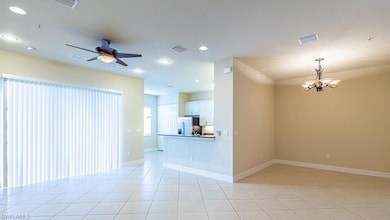 Spare room featuring light tile patterned flooring