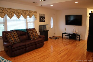 Large Family room, look at those beautiful floors!