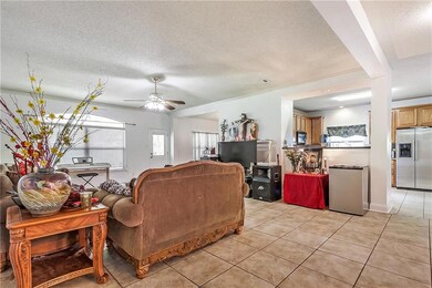 DEN HAS LOTS OF NATURAL LIGHT. OPEN FLOOR PLAN
