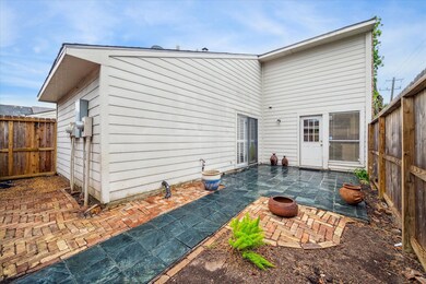 Private outdoor patio perfect with access to carport and home.