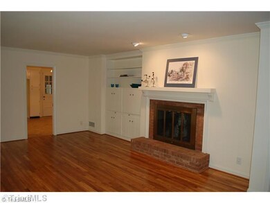 Den/Family/Great Room. Light & bright family room features recessed lighting & eyeball lighting over the masonry fireplace & great built-ins.