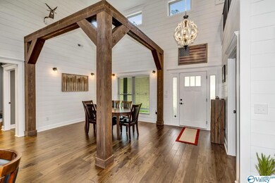 Gorgeous cedar beams define the dining area.