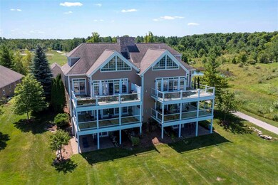 9290 Fairway View unit Building 10 Unit 4, Charlevoix, MI 49720 - photo 2