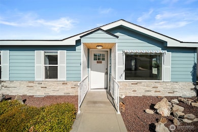 Inviting entryway with classy low-maintenance landscaping.