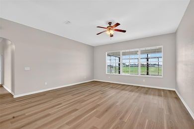 Living Room with Golf and Water Views