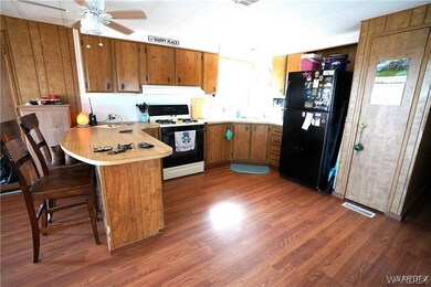 Kitchen featuring gas range gas stove, a kitchen b