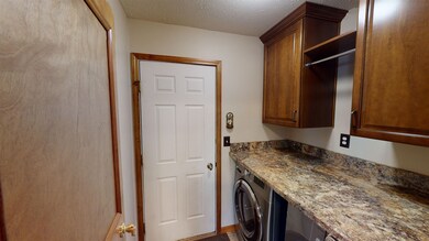 Custom Cana cabinetry to match the kitchen contain